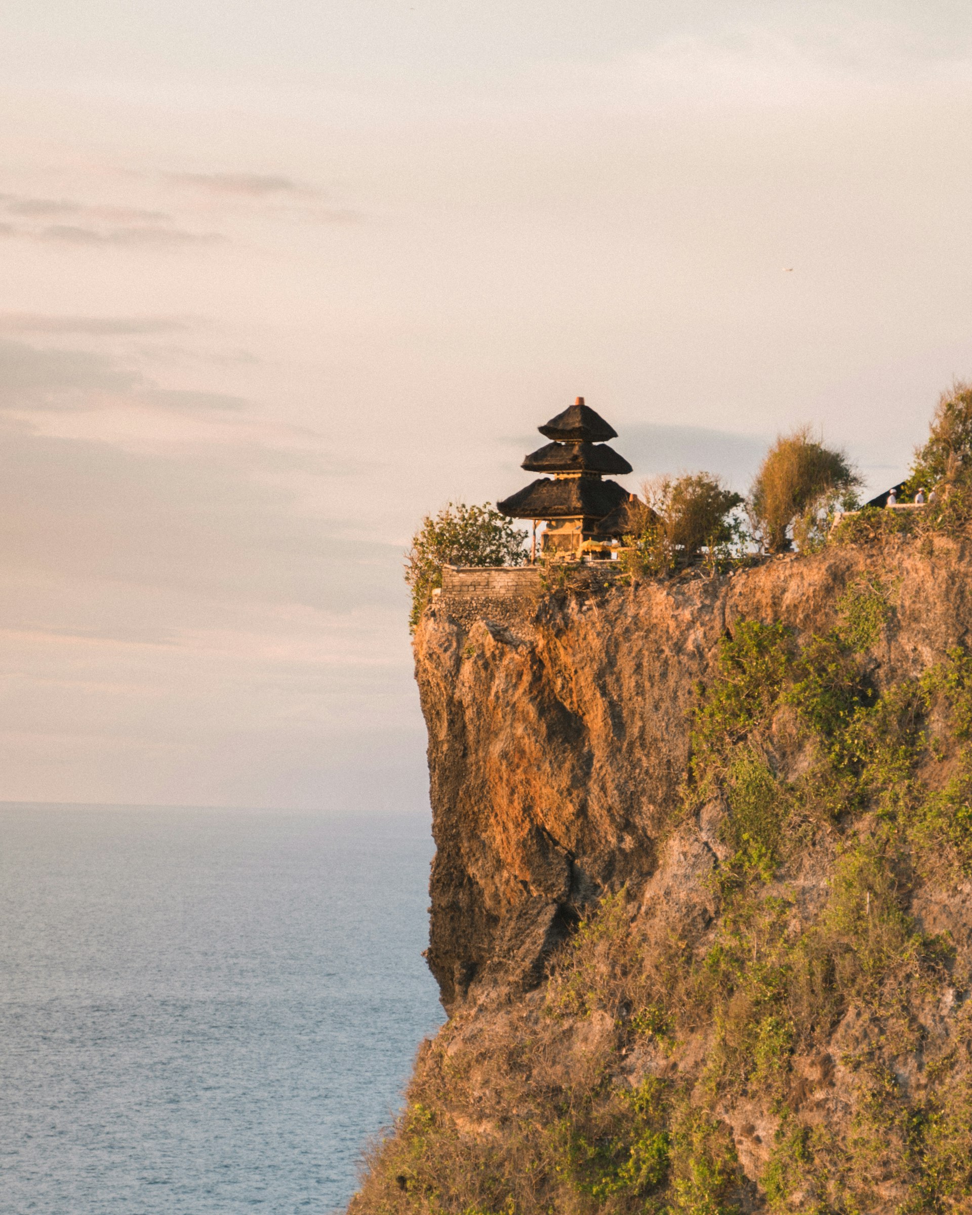 Uluwatu cliff temple at sunset